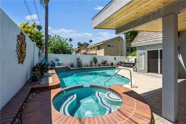 1879 N Nordic Pl, Orange, CA 92865 - view of pool featuring a pool with connected hot tub, a fenced backyard, and a patio