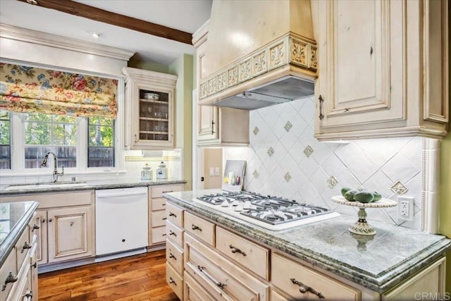 16056 Avenida Calma, Rancho Santa Fe, CA 92091 - kitchen with white appliances, custom range hood, decorative backsplash, light wood finished floors, and light stone countertops