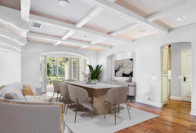 16056 Avenida Calma, Rancho Santa Fe, CA 92091 - dining room with coffered ceiling, arched walkways, light wood-style floors, and beamed ceiling