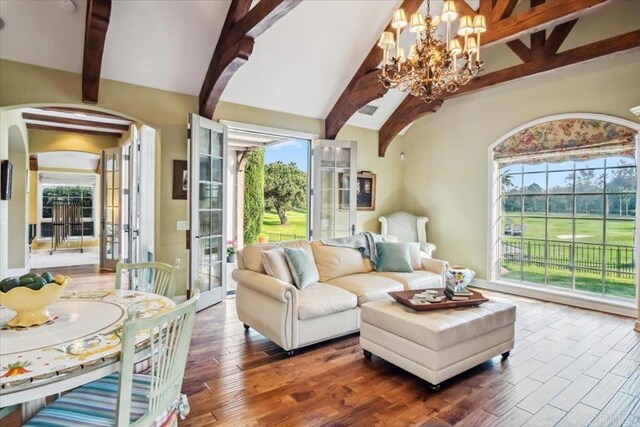 16056 Avenida Calma, Rancho Santa Fe, CA 92091 - living area featuring arched walkways, a chandelier, and wood finished floors
