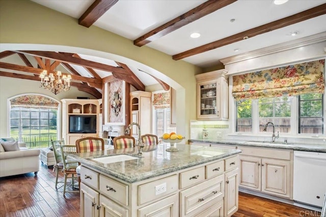 16056 Avenida Calma, Rancho Santa Fe, CA 92091 - kitchen with white dishwasher, open floor plan, arched walkways, healthy amount of natural light, and recessed lighting