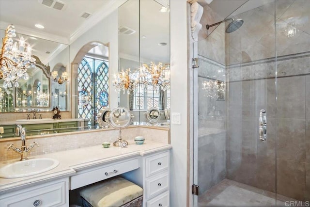 16056 Avenida Calma, Rancho Santa Fe, CA 92091 - bathroom with crown molding, a shower stall, vanity, backsplash, and a chandelier