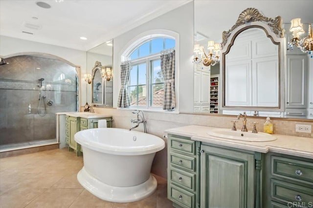 16056 Avenida Calma, Rancho Santa Fe, CA 92091 - full bathroom featuring a stall shower, vanity, a soaking tub, tile patterned floors, and a chandelier