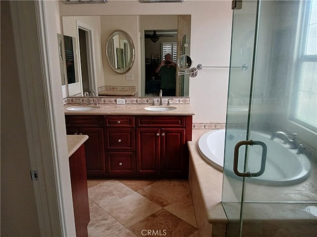 2520 Cornerstone Ln, Costa Mesa, CA 92626 - bathroom featuring double vanity, a bath, a stall shower, ceiling fan, and tile patterned floors