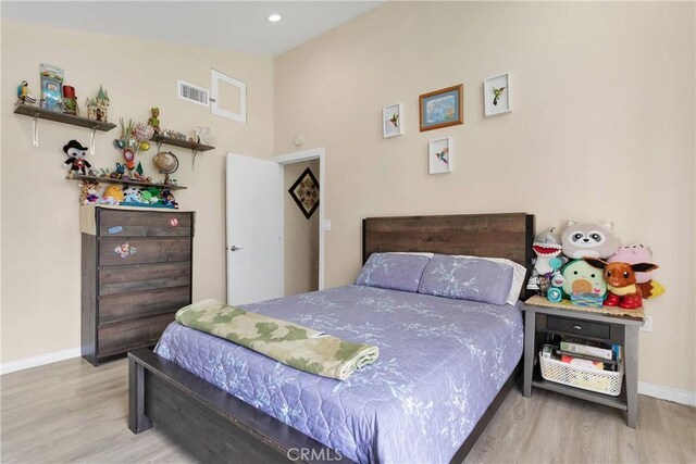 18060 Pebble Beach Dr, Victorville, CA 92395 - bedroom with wood finished floors, baseboards, and recessed lighting