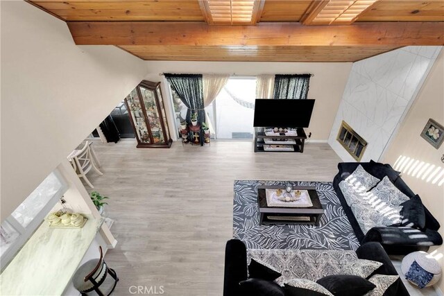 18060 Pebble Beach Dr, Victorville, CA 92395 - living room with wooden ceiling, wood finished floors, and a tile fireplace
