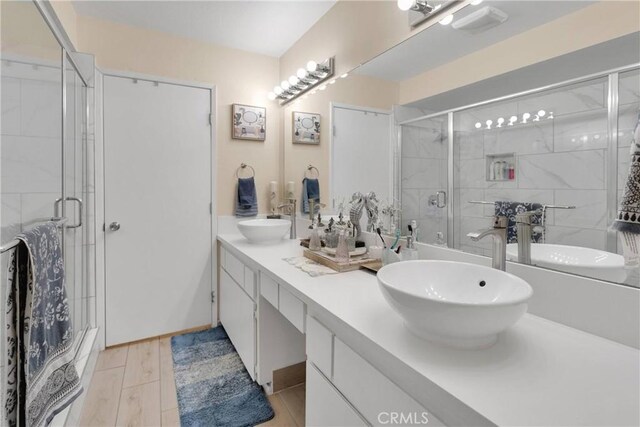 18060 Pebble Beach Dr, Victorville, CA 92395 - full bath featuring a shower stall and double vanity