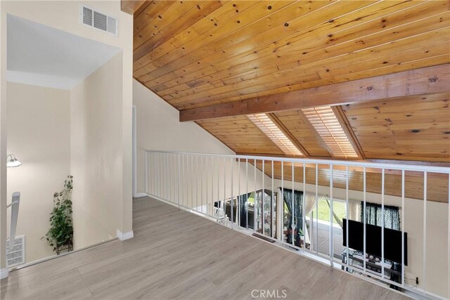18060 Pebble Beach Dr, Victorville, CA 92395 - corridor featuring wooden ceiling, wood finished floors, lofted ceiling, and baseboards