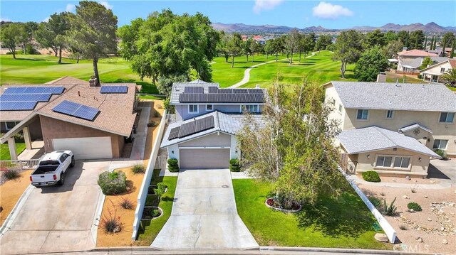 18060 Pebble Beach Dr, Victorville, CA 92395 - aerial perspective of suburban area with a golf club and mountains