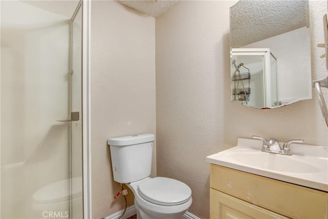 615 S Hewitt St, San Jacinto, CA 92583 - bathroom with vanity, a stall shower, and a textured wall