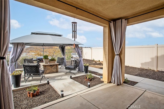 24449 Payton Dr, Lake Elsinore, CA 92532 - view of patio with a gazebo and a fenced backyard