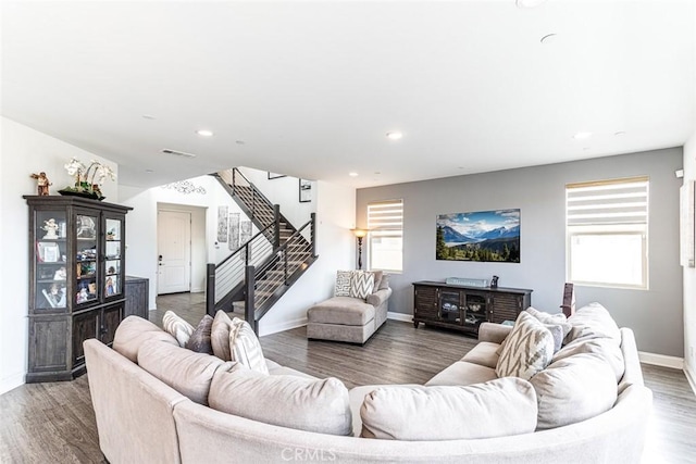 24449 Payton Dr, Lake Elsinore, CA 92532 - living area with wood finished floors, baseboards, recessed lighting, and stairway