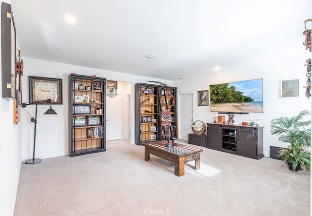 24449 Payton Dr, Lake Elsinore, CA 92532 - living area with carpet, recessed lighting, and baseboards