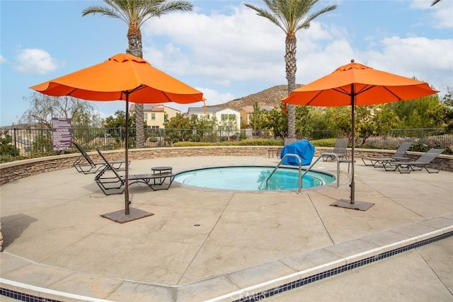 24449 Payton Dr, Lake Elsinore, CA 92532 - view of pool featuring fence, a patio area, a pool, and a mountain view