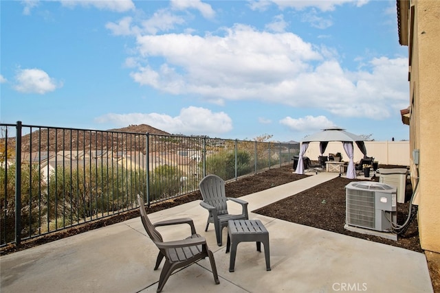 24449 Payton Dr, Lake Elsinore, CA 92532 - view of patio featuring a gazebo, a fenced backyard, and central air condition unit