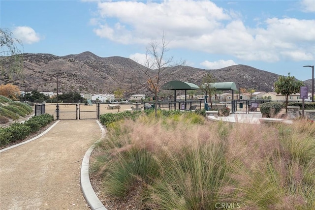 24449 Payton Dr, Lake Elsinore, CA 92532 - view of yard with a gate, fence, and a mountain view