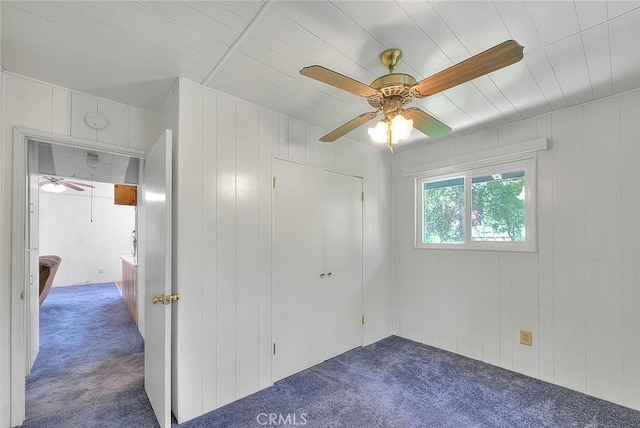 771 Woodland Rd, Crestline, CA 92325 - unfurnished bedroom with carpet flooring and ceiling fan