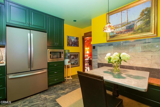 11 N San Gabriel Canyon Rd, Azusa, CA 91702 - kitchen with stainless steel appliances, green cabinetry, and hanging light fixtures