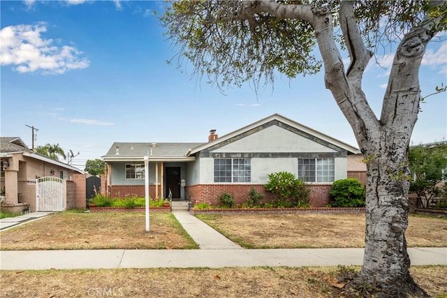14512 Lefloss Ave, Norwalk, CA 90650 - single story home featuring brick siding, a gate, and stucco siding
