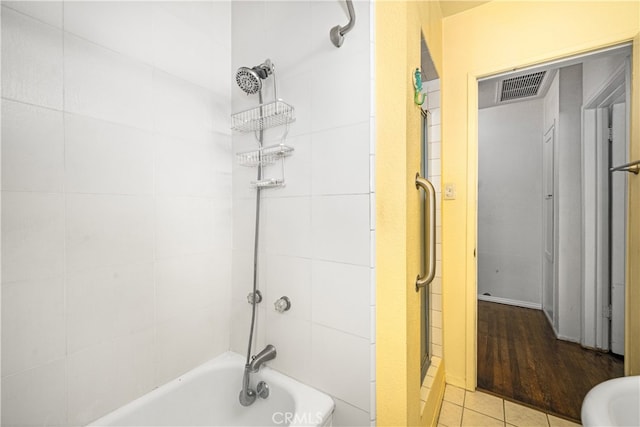 14512 Lefloss Ave, Norwalk, CA 90650 - bathroom featuring washtub / shower combination