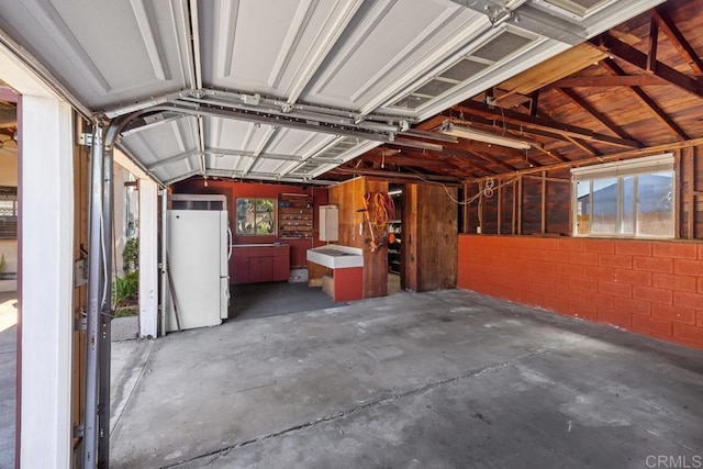 3973 69th St, San Diego, CA 92115 - garage with freestanding refrigerator