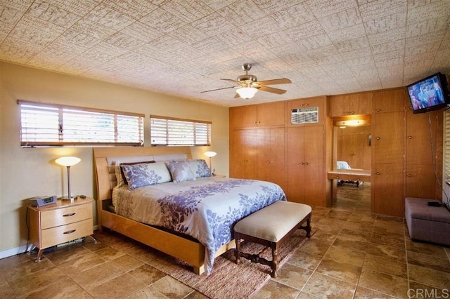 3973 69th St, San Diego, CA 92115 - bedroom featuring a wall unit AC, a closet, and a ceiling fan