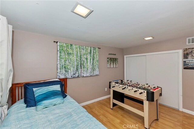 22365 Pine Dr, Cedarpines Park, CA 92322 - rec room with light wood finished floors and baseboards
