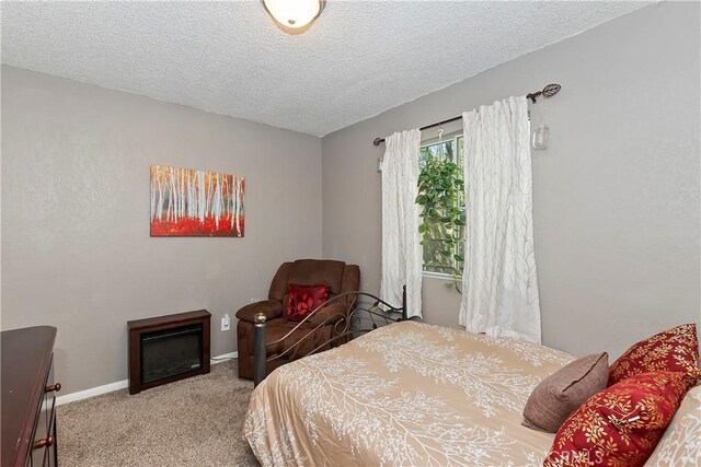 22365 Pine Dr, Cedarpines Park, CA 92322 - carpeted bedroom with a textured ceiling and baseboards