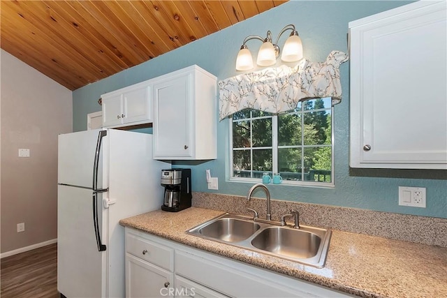 22365 Pine Dr, Cedarpines Park, CA 92322 - kitchen with a sink, freestanding refrigerator, white cabinets, wooden ceiling, and light countertops