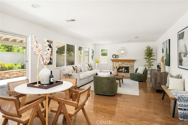 40 Calais, Irvine, CA 92602 - living area with light wood-style flooring and a fireplace