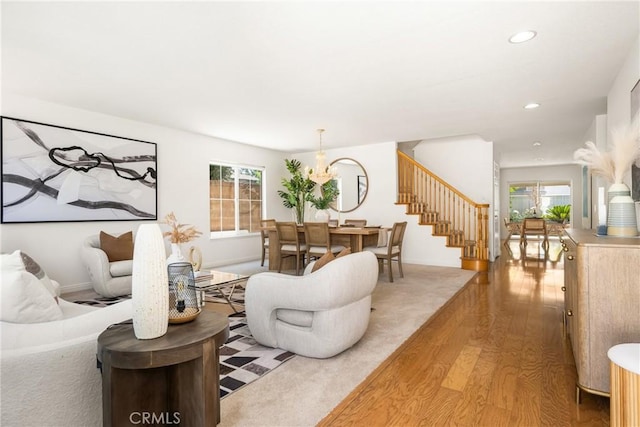 40 Calais, Irvine, CA 92602 - living area with wood finished floors, stairs, a chandelier, and recessed lighting