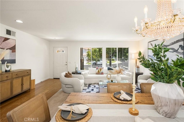 40 Calais, Irvine, CA 92602 - living area with a chandelier, recessed lighting, baseboards, and light wood-style floors