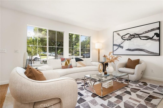 40 Calais, Irvine, CA 92602 - living area featuring healthy amount of natural light and baseboards