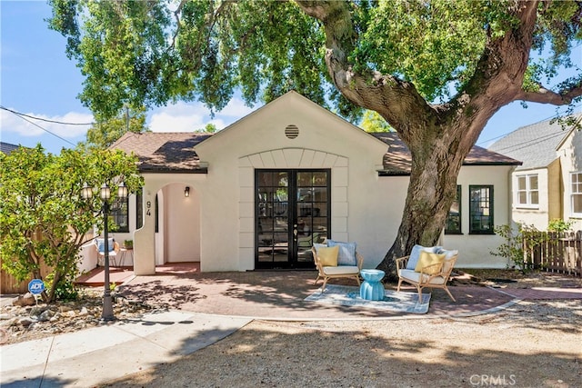 94 E Highland Ave, Sierra Madre, CA 91024 - view of front of property featuring french doors, stucco siding, and a shingled roof