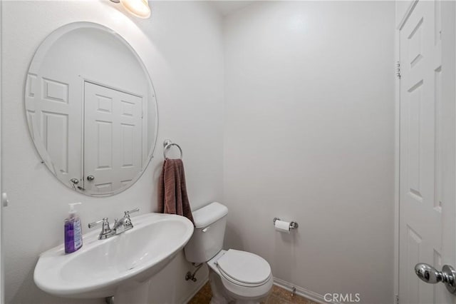 40991 Bankhall St, Lake Elsinore, CA 92532 - half bath with a sink, toilet, and baseboards