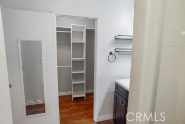 27929 Tyler Ln Unit 744, Canyon Country, CA 91387 - walk in closet with dark wood finished floors