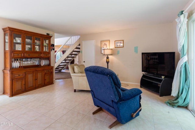 686 Martinique Pl, Newbury Park, CA 91320 - living area with stairs, light tile patterned floors, and baseboards