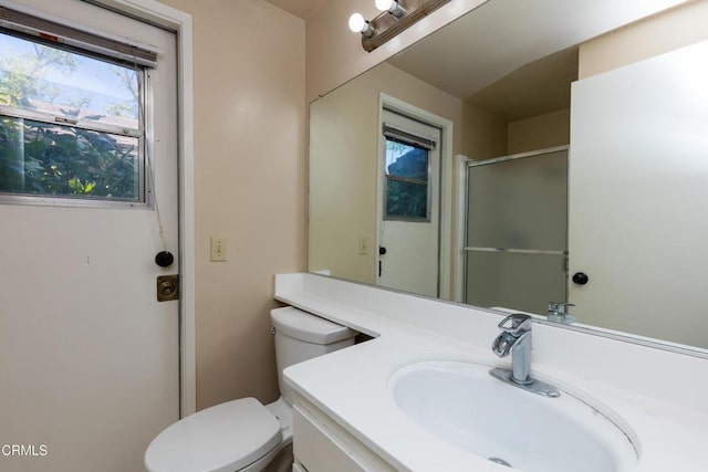 686 Martinique Pl, Newbury Park, CA 91320 - bathroom featuring toilet, vanity, and a shower with door