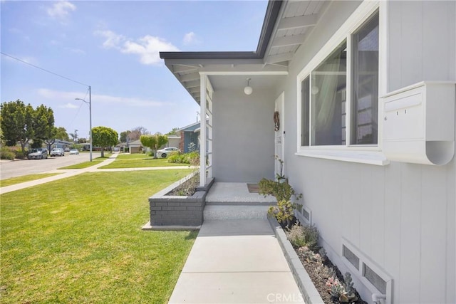 2829 Albury Ave, Long Beach, CA 90815 - property entrance featuring a lawn