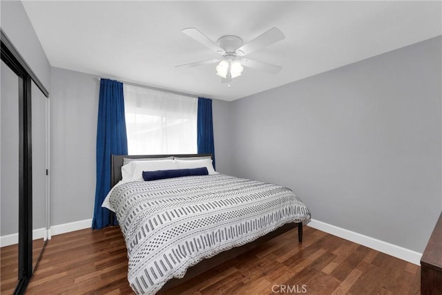 2829 Albury Ave, Long Beach, CA 90815 - bedroom with baseboards, a closet, wood finished floors, and a ceiling fan