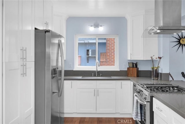 2829 Albury Ave, Long Beach, CA 90815 - kitchen with appliances with stainless steel finishes, wall chimney exhaust hood, a sink, and white cabinetry