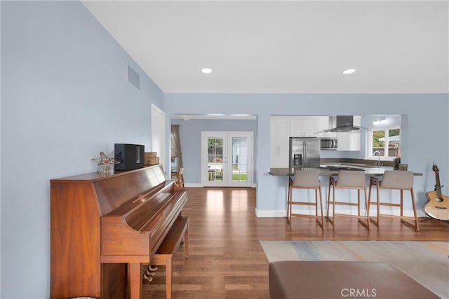 2829 Albury Ave, Long Beach, CA 90815 - living room with french doors, dark wood-style flooring, baseboards, and recessed lighting