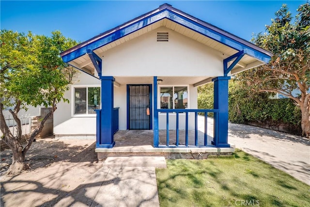 10091011 W Myrtle St, Santa Ana, CA 92703 - view of front of property featuring a porch and stucco siding