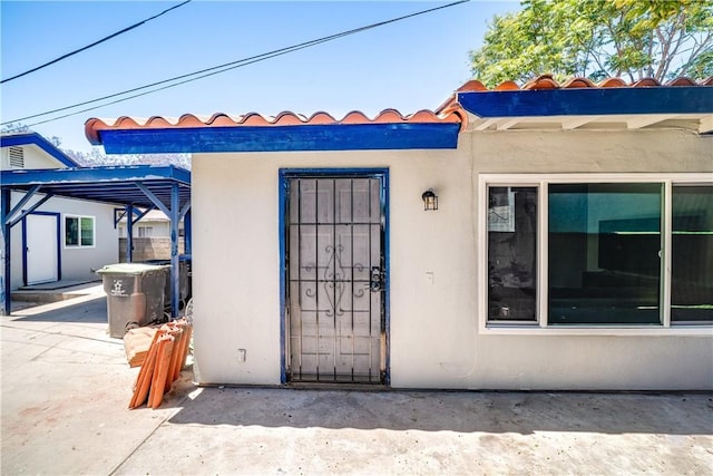 10091011 W Myrtle St, Santa Ana, CA 92703 - entrance to property with stucco siding and a tiled roof