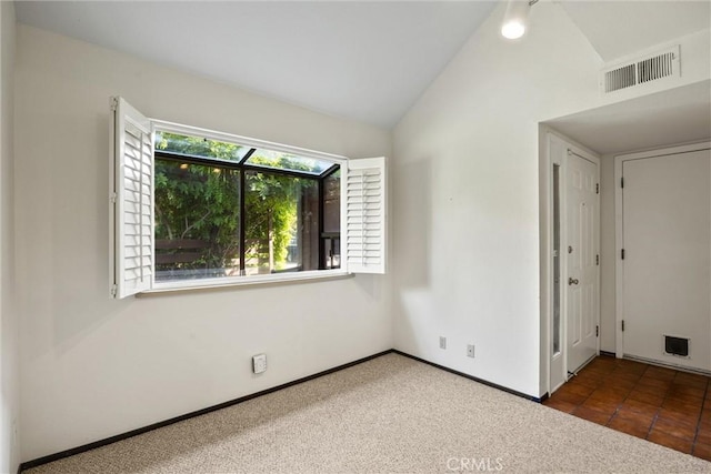 2912 Pennyroyal Dr, Chico, CA 95928 - unfurnished room featuring vaulted ceiling, carpet floors, and baseboards