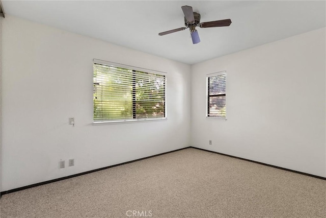 2912 Pennyroyal Dr, Chico, CA 95928 - carpeted empty room with baseboards and ceiling fan