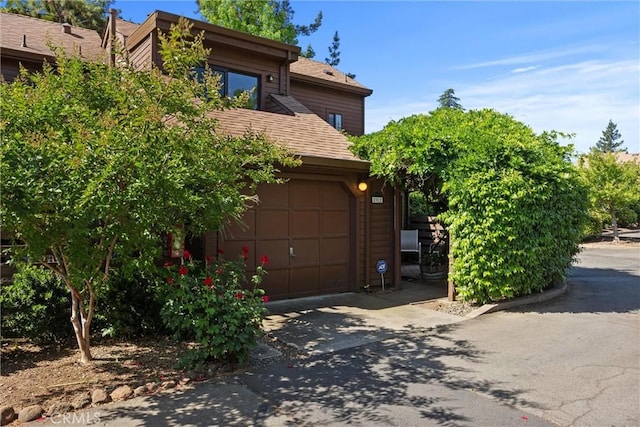2912 Pennyroyal Dr, Chico, CA 95928 - view of front of house featuring concrete driveway and a garage
