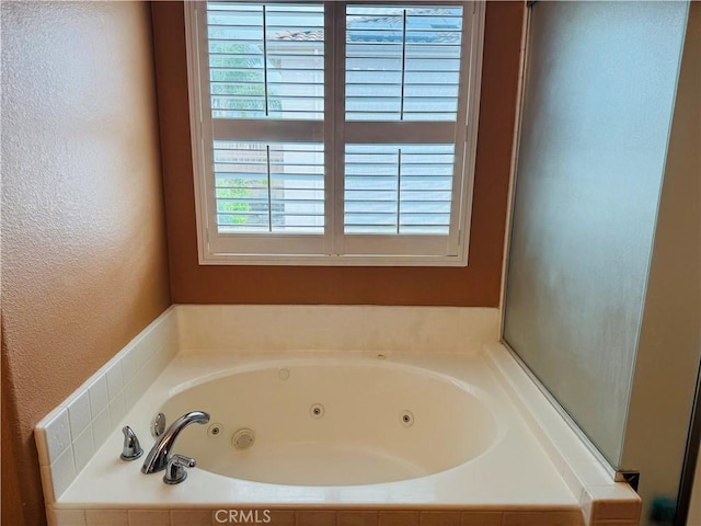 5486 Alexandrine Ct, Oceanside, CA 92057 - full bath with a tub with jets and a textured wall
