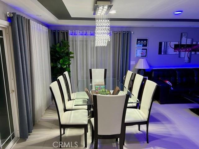 2163 N Justin Ave N, Simi Valley, CA 93065 - dining room featuring a chandelier and a raised ceiling