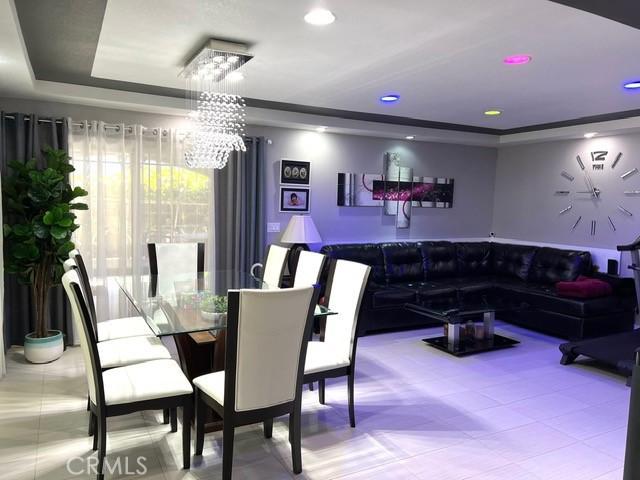 2163 N Justin Ave N, Simi Valley, CA 93065 - dining space with a raised ceiling, a chandelier, and recessed lighting